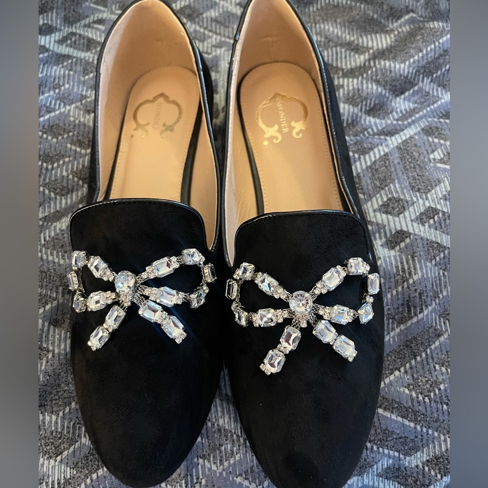 C. Wonder Bow Loafers